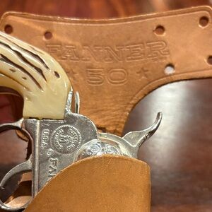 Silver and Cream Toy Revolver Set